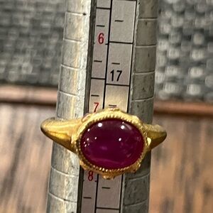 Gold Ring with Purple Stone